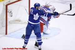Toronto Maple Leafs John Tavares tries to tip the puck past Ranger goaltender Alexandar Georgiev  - Luke Durda/In Play! Magazine