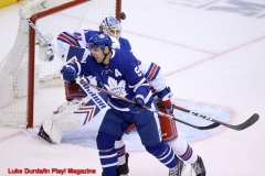 Toronto Maple Leafs John Tavares tips a shot in front of the net- Luke Durda/In Play! Magazine