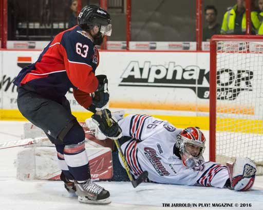 Brad Latour of the Windsor Spitfires scoring on Oshawa
